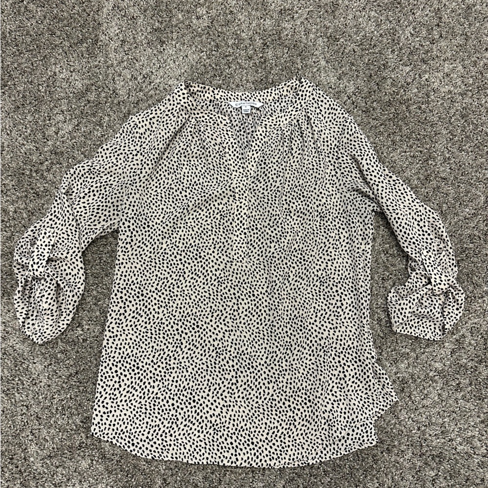 White and black polka dot blouse